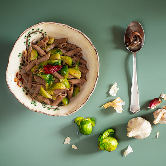 Penne integrali di Farro con cavoletti di Bruxelles e acciughe