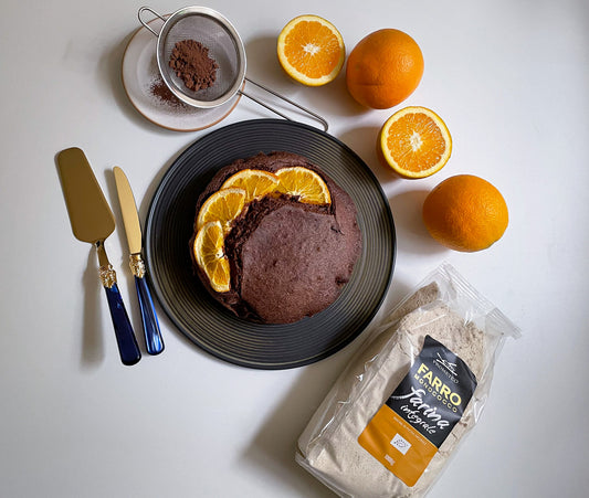 TORTA DI FARRO AL VAPORE CON ARANCIA E CACAO